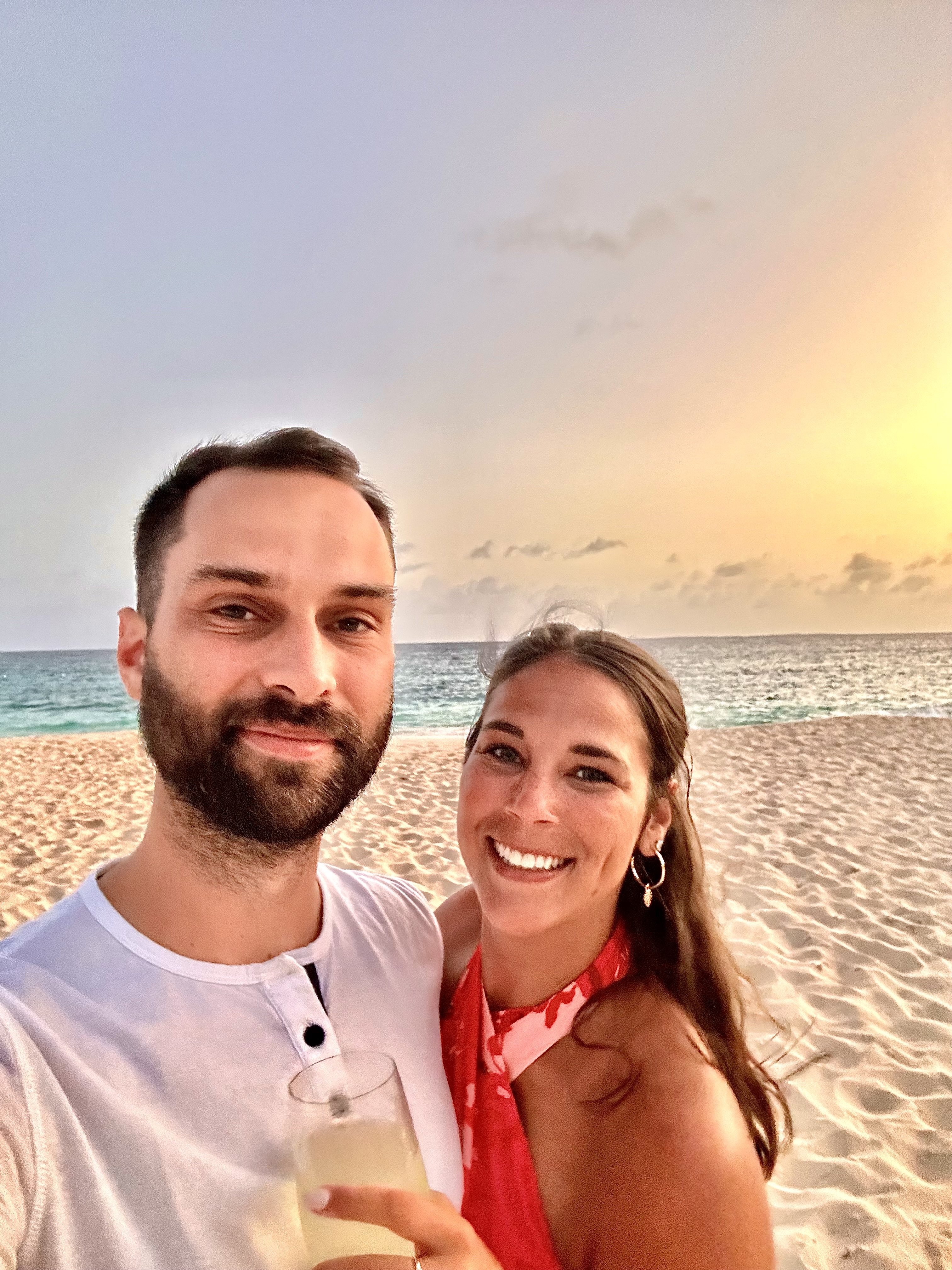 Emily on beach with her husband