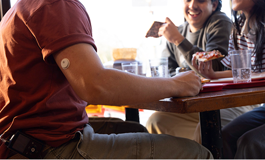 Close up of arm with Instinct sensor - Own It