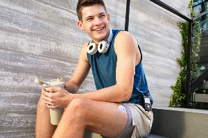 MiniMed Champion Roman sitting smiling crop