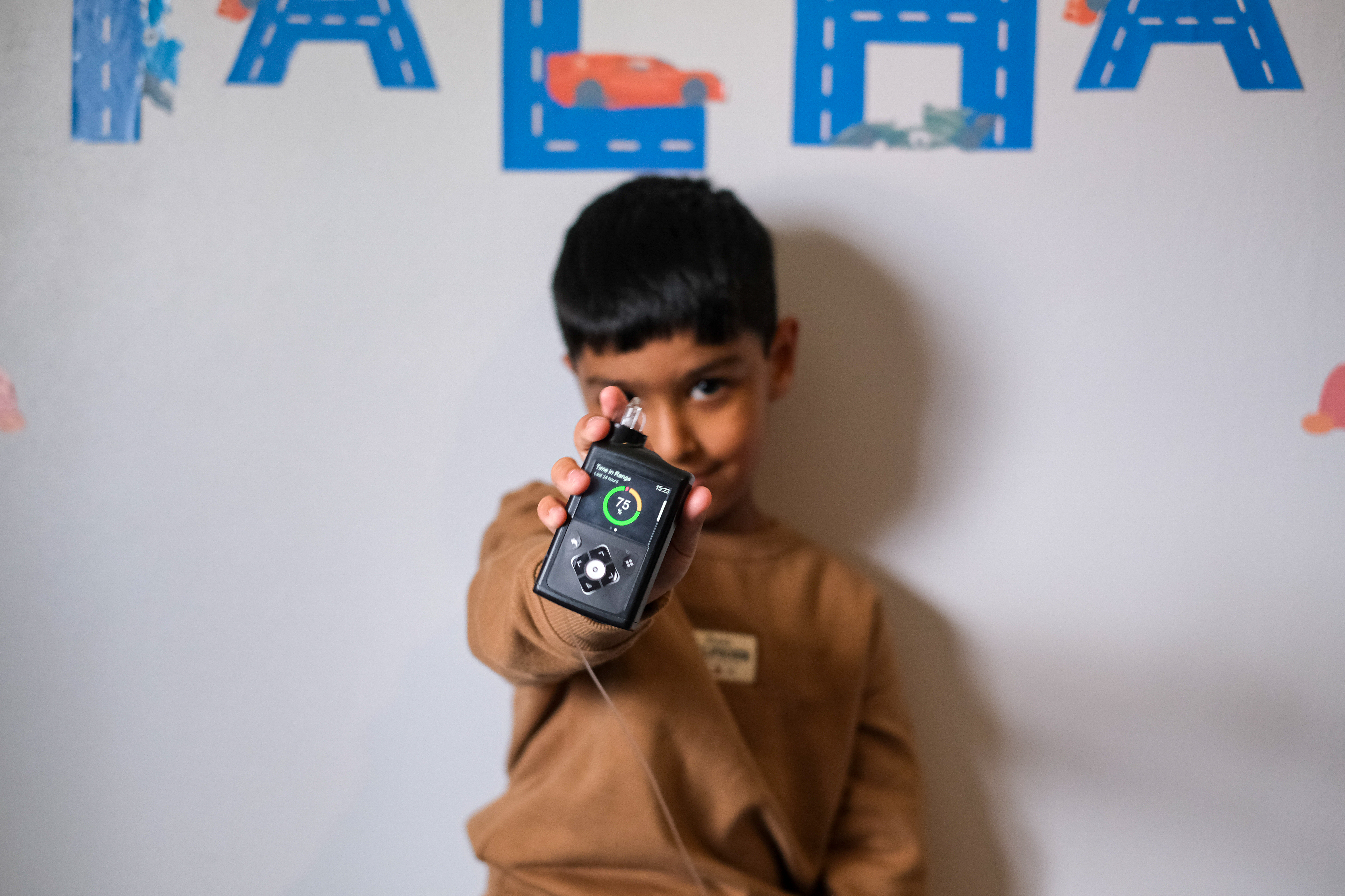 Talha holding a 780G pump