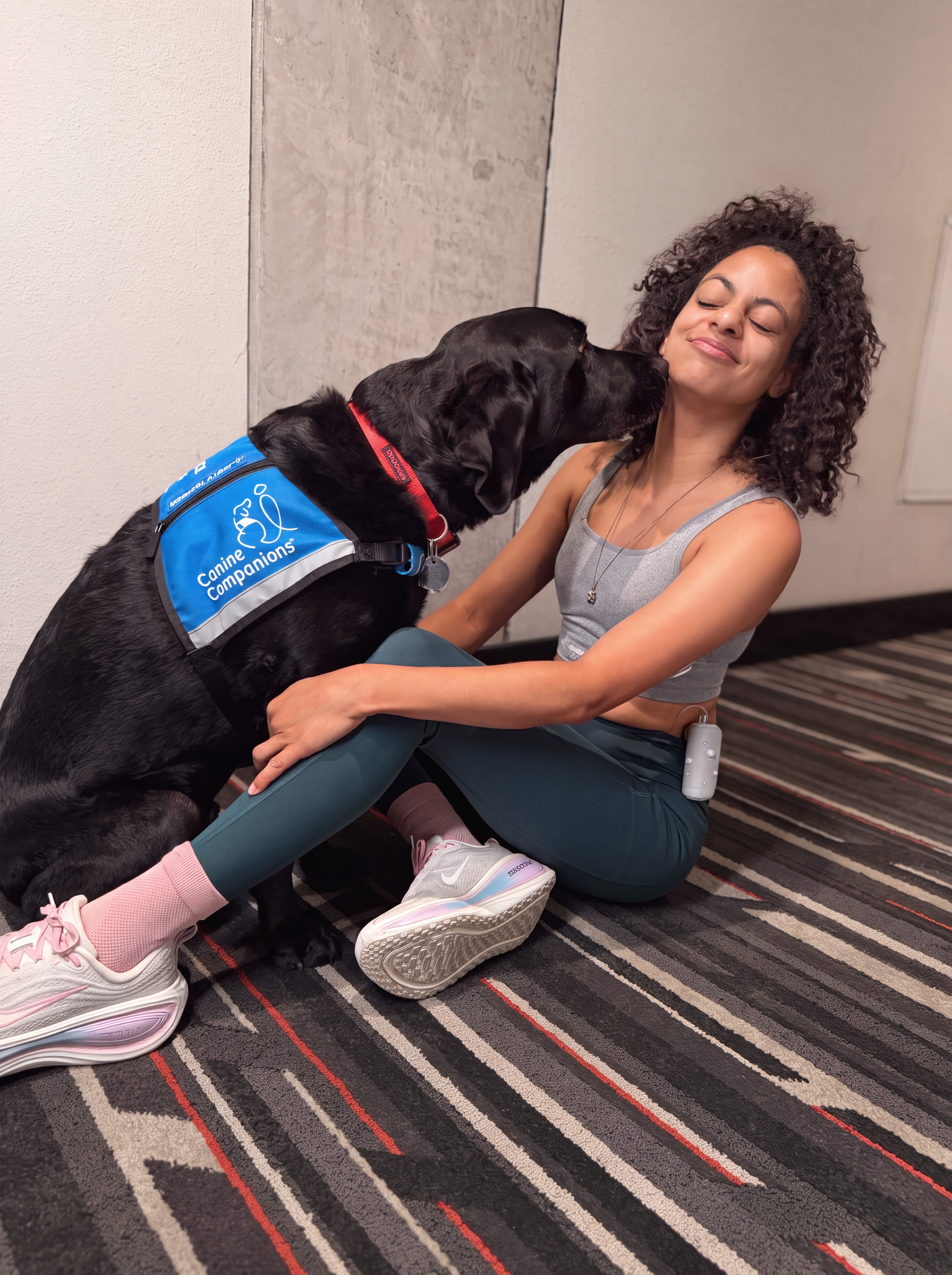 MiniMed Champion Monique with her alert dog Jolo