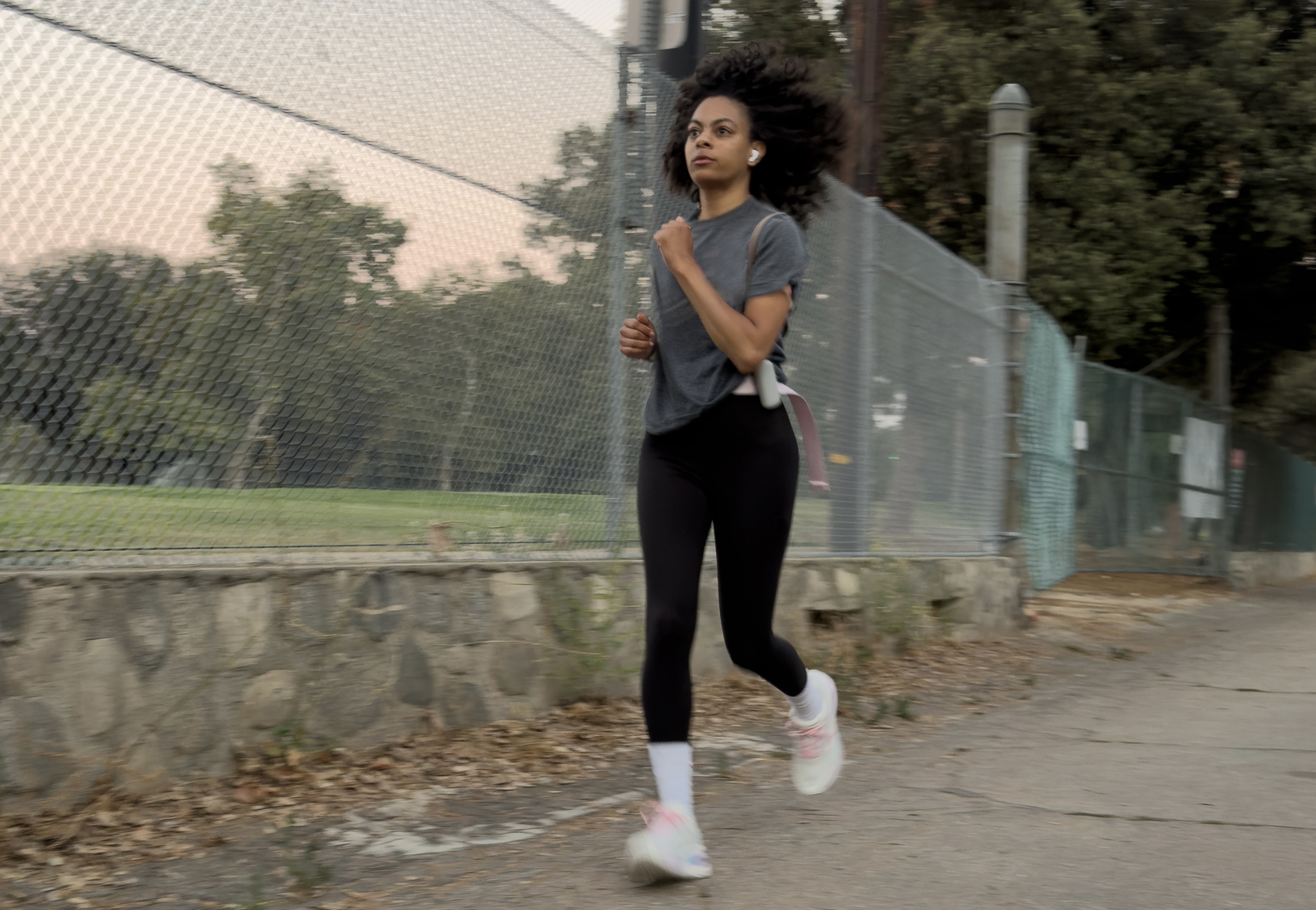 MiniMed Champion Monique running wearing MiniMed Flex