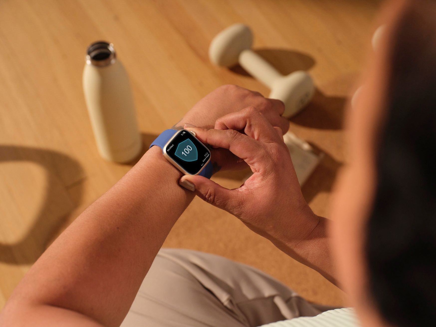 Smartwatch displaying MiniMed mobile app glucose data
